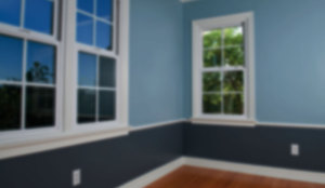 Interior of home with no furniture and blue walls
