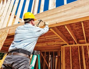 builder hammering no house frame wood