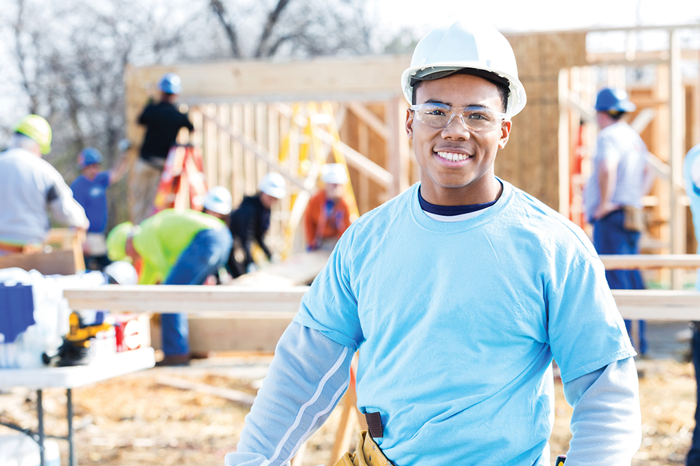 construction worker building new home with warranty builder warranty peace of mind